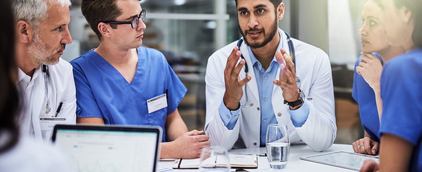 Healthcare professionals consult on patient care
