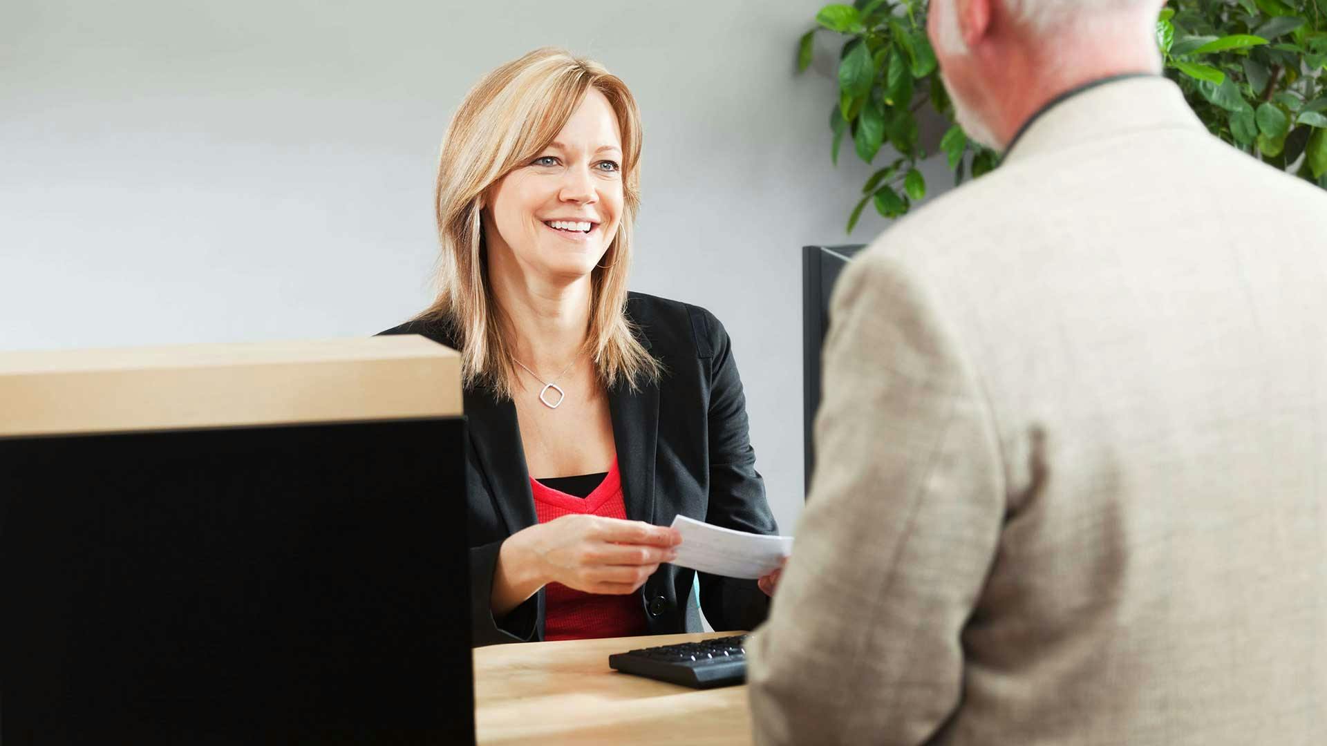 Member being served by teller | credit union modernization