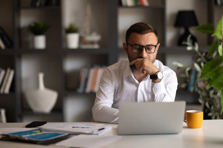 Team analyzes member and loan performance reports