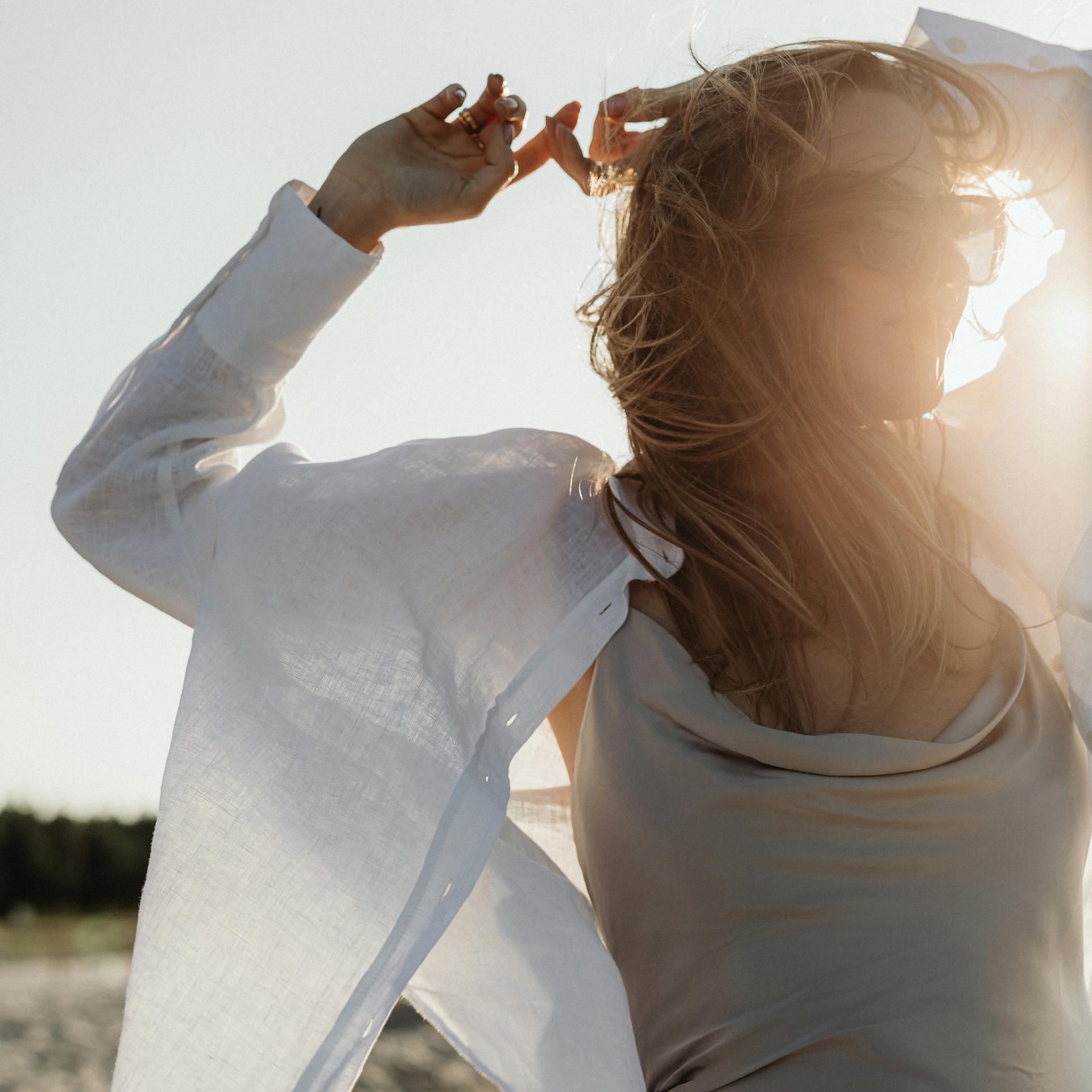Woman silhouette on the beach