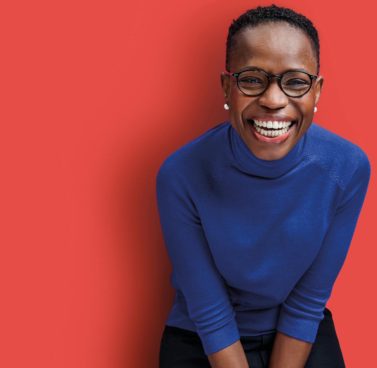 Eine lachende Person vor einem orangenen Hintergrund, daneben der Schriftzug "Vivantes Hauptstadtpflege. Hier bist du wichtig."