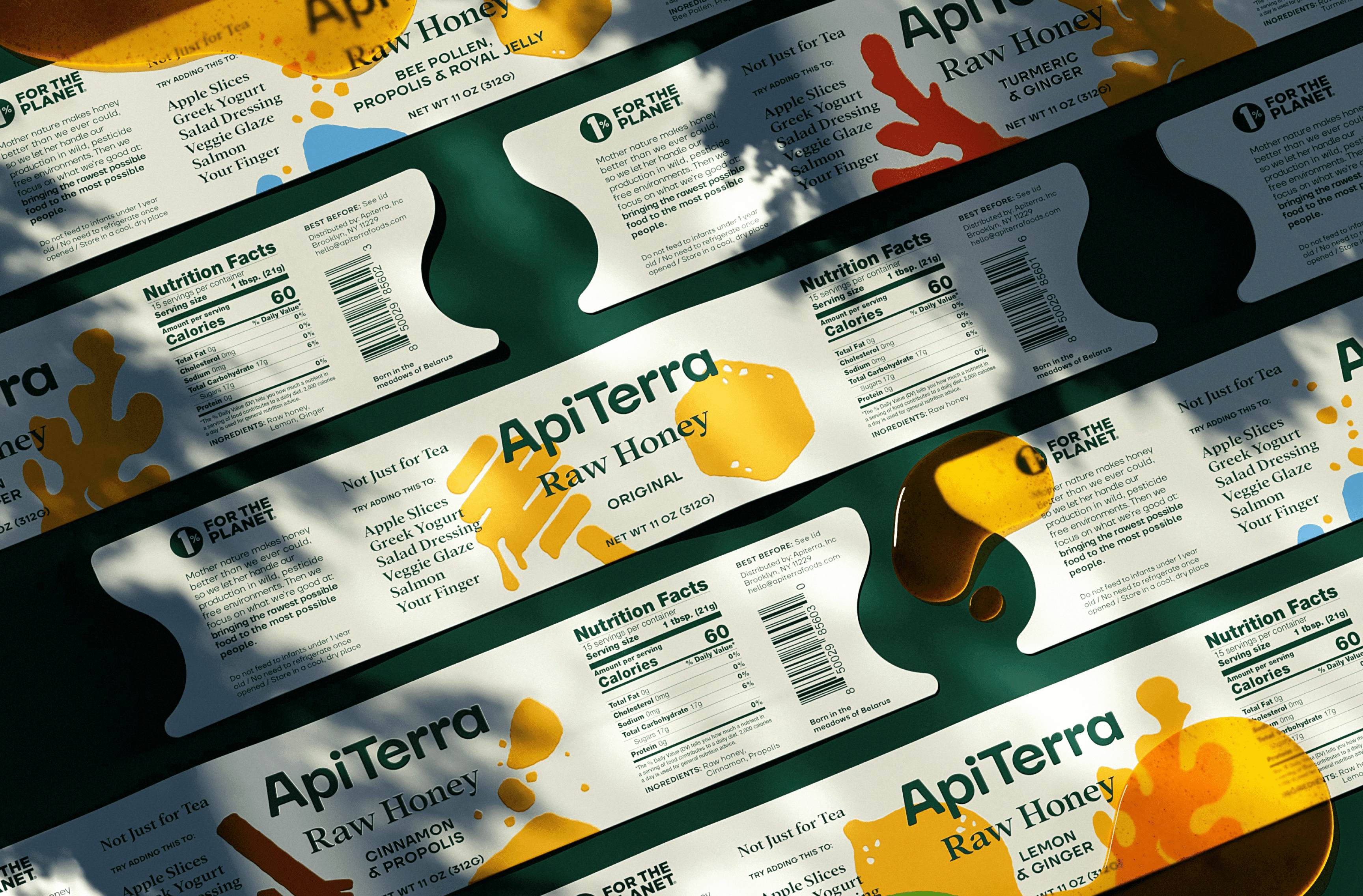 apiterra honey labels laid out on green background