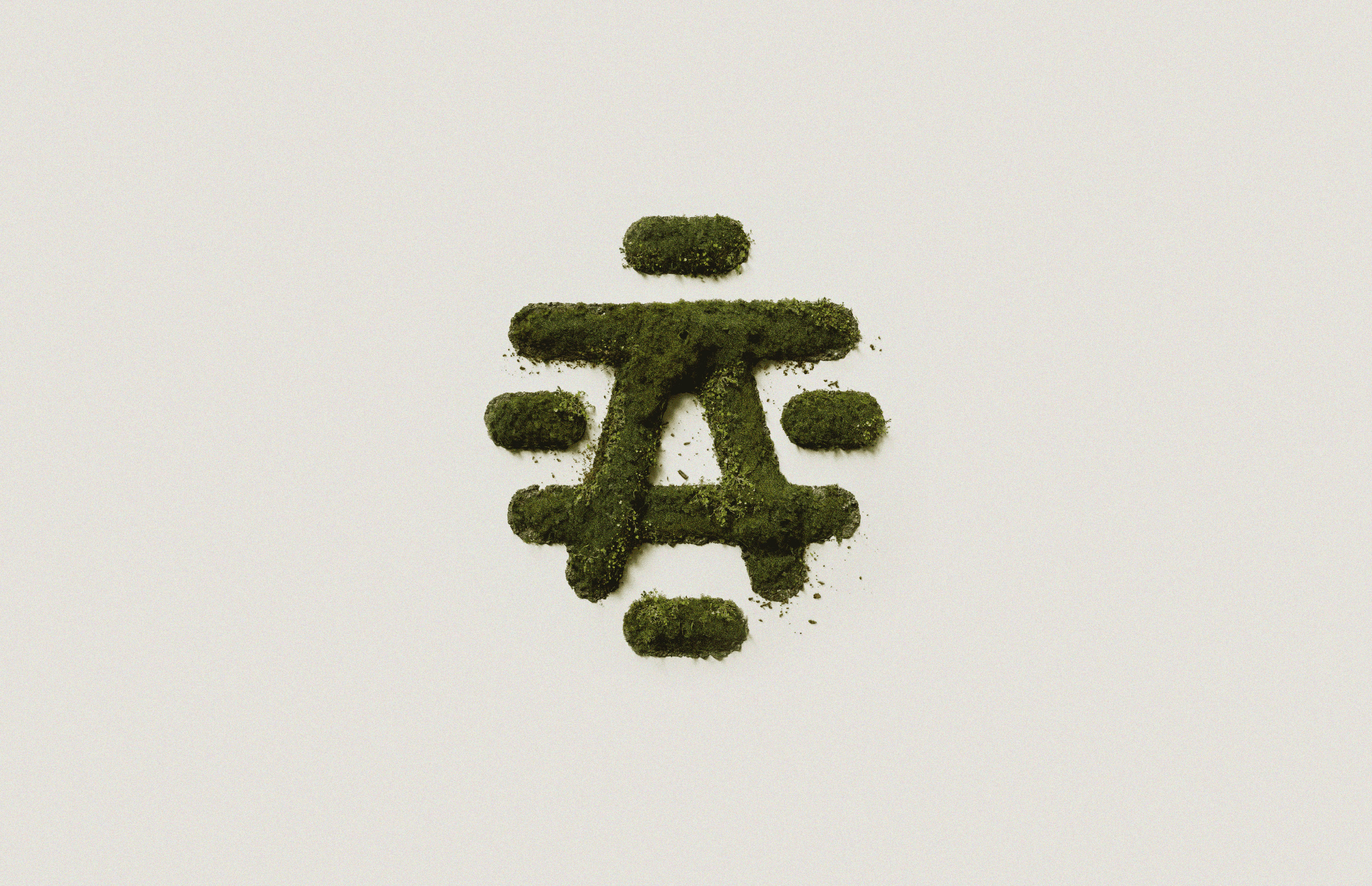 apiterra symbol made of grass