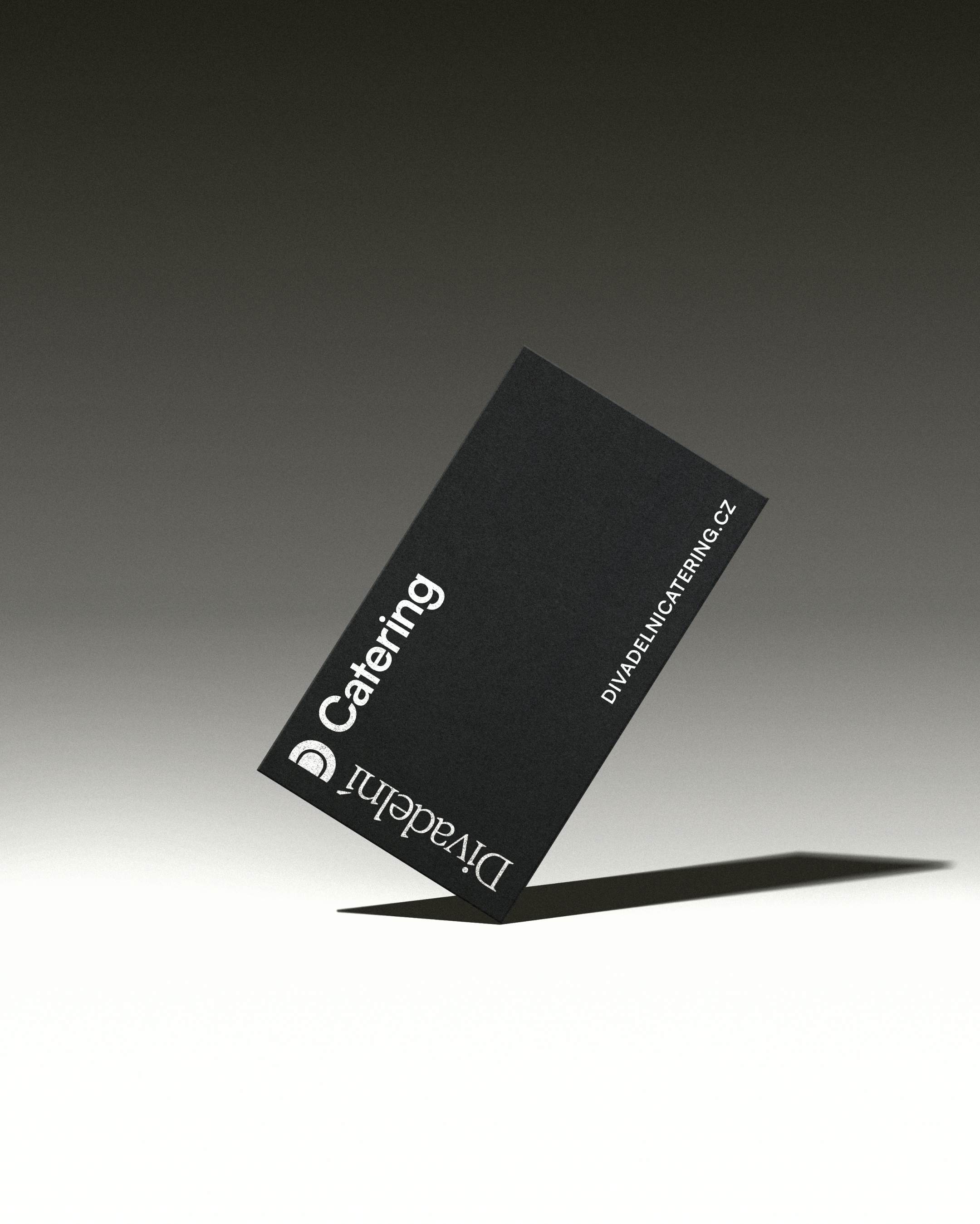 black business card standing on its corner