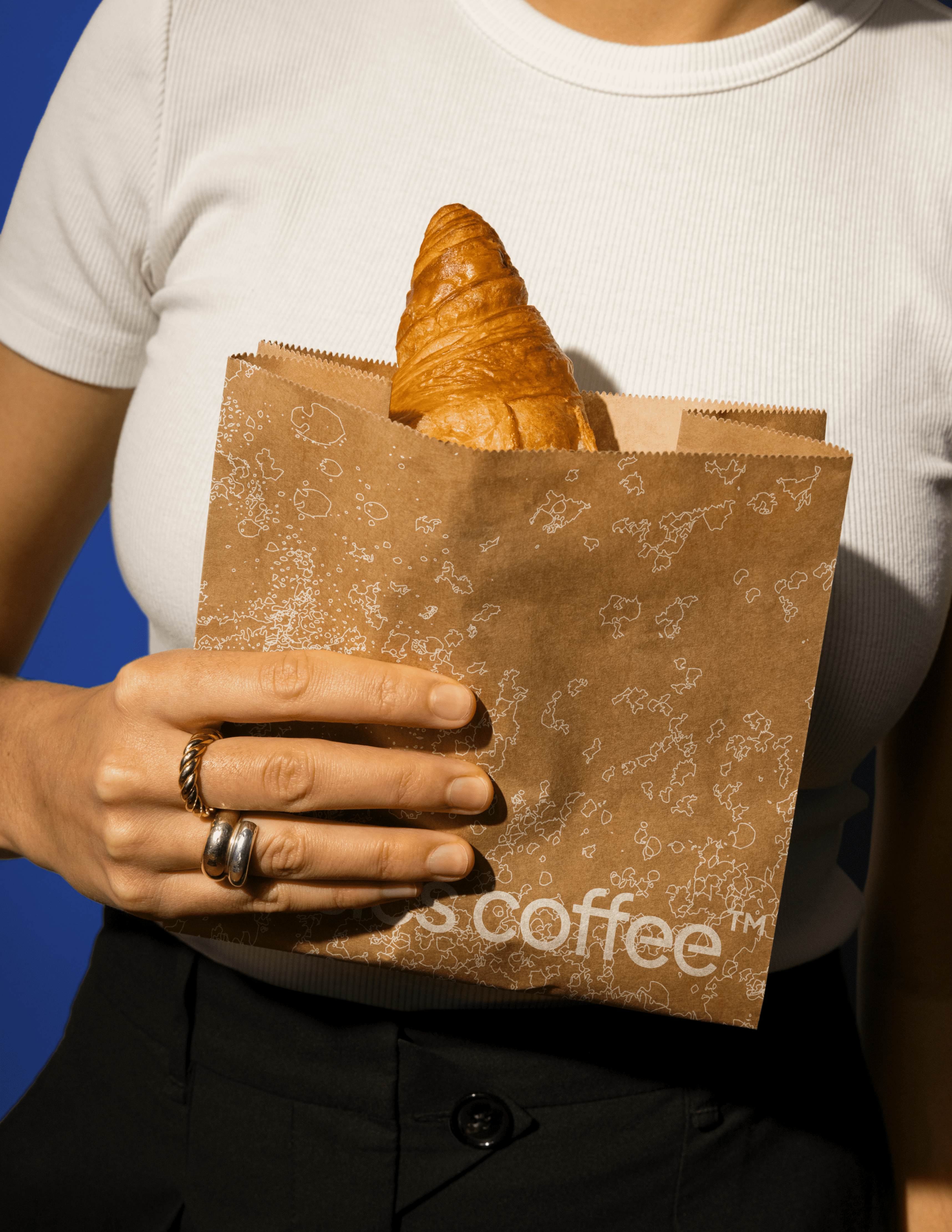 person holding a pastry bag