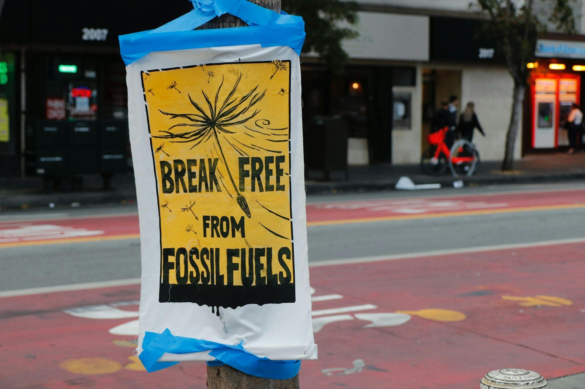 Photo of poster reading "Break free from fossil fuels"
