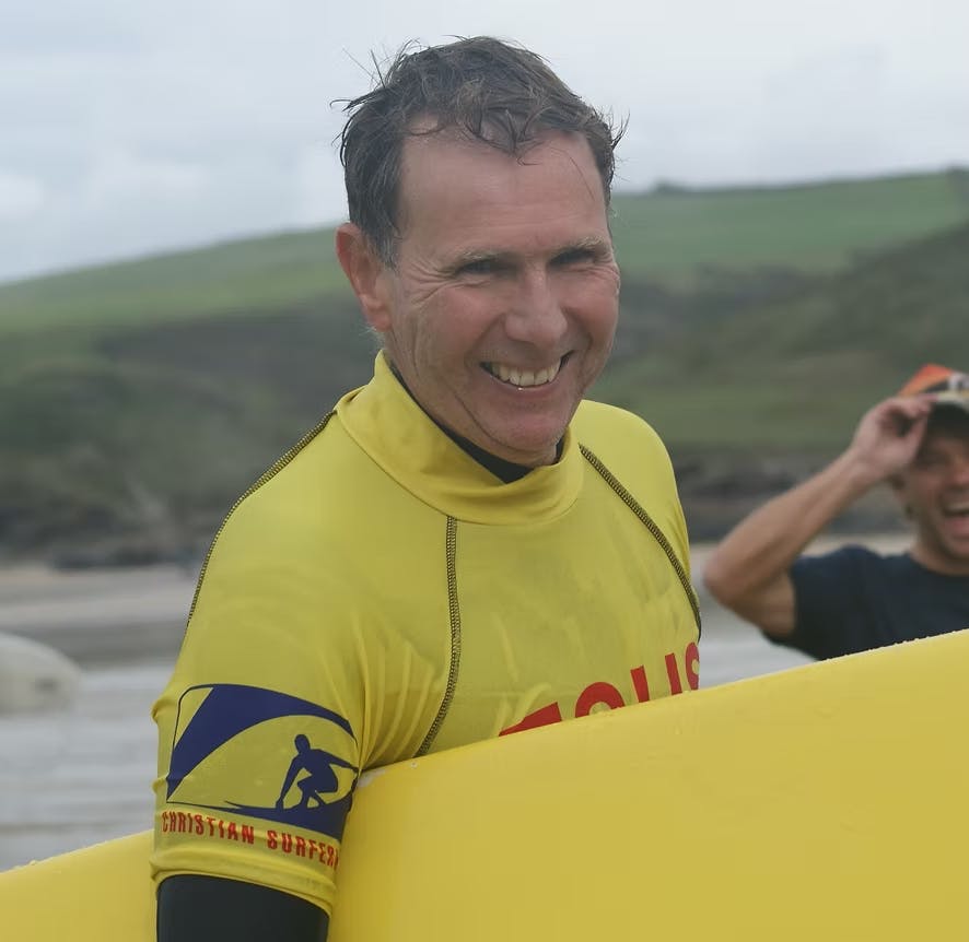 Richard Gowers with his surfbaord