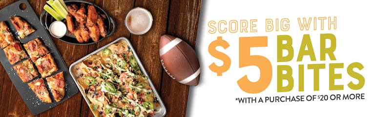 Image of a top view of a table with several bar bites on it, and a football. Score Big with $5 Bar Bites *with a purchase of $20 or more.