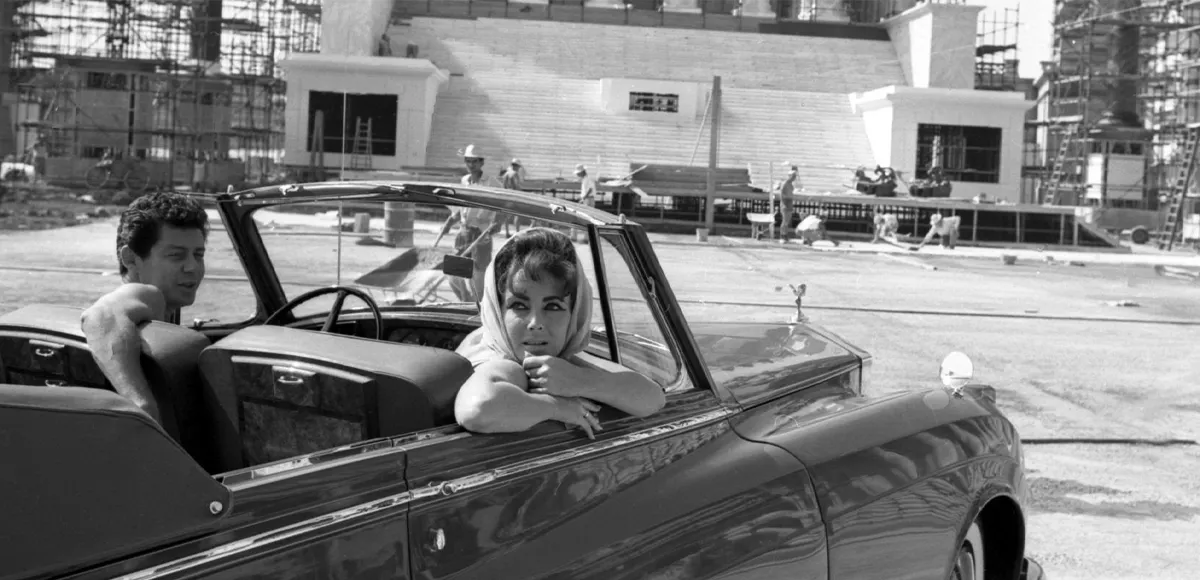 Elizabeth Taylor and Eddie Fisher in the 'Green Goddess.' 