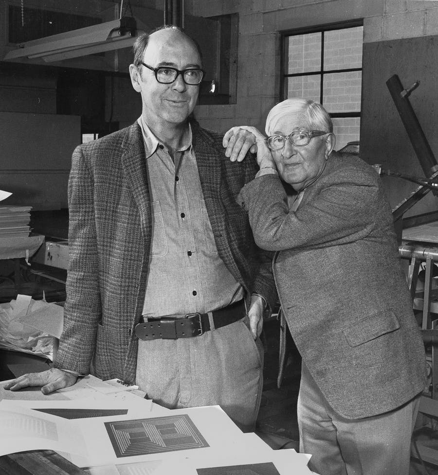 Josef Albers and his student Norman Ives at work on "Formulation : Articulation", 1972. Photo by Jthill84/Template: John T. Hill (License CC BY-SA 4.0)
