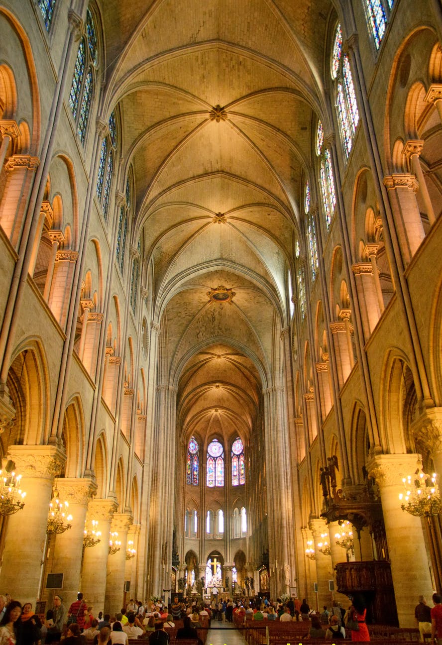Notre-Dame in May 2012. From top to bottom, nave walls are pierced by clerestory windows, arches to triforium, and arches to side aisles. Photo by Peter K Burian - Own work, CC BY-SA 4.0