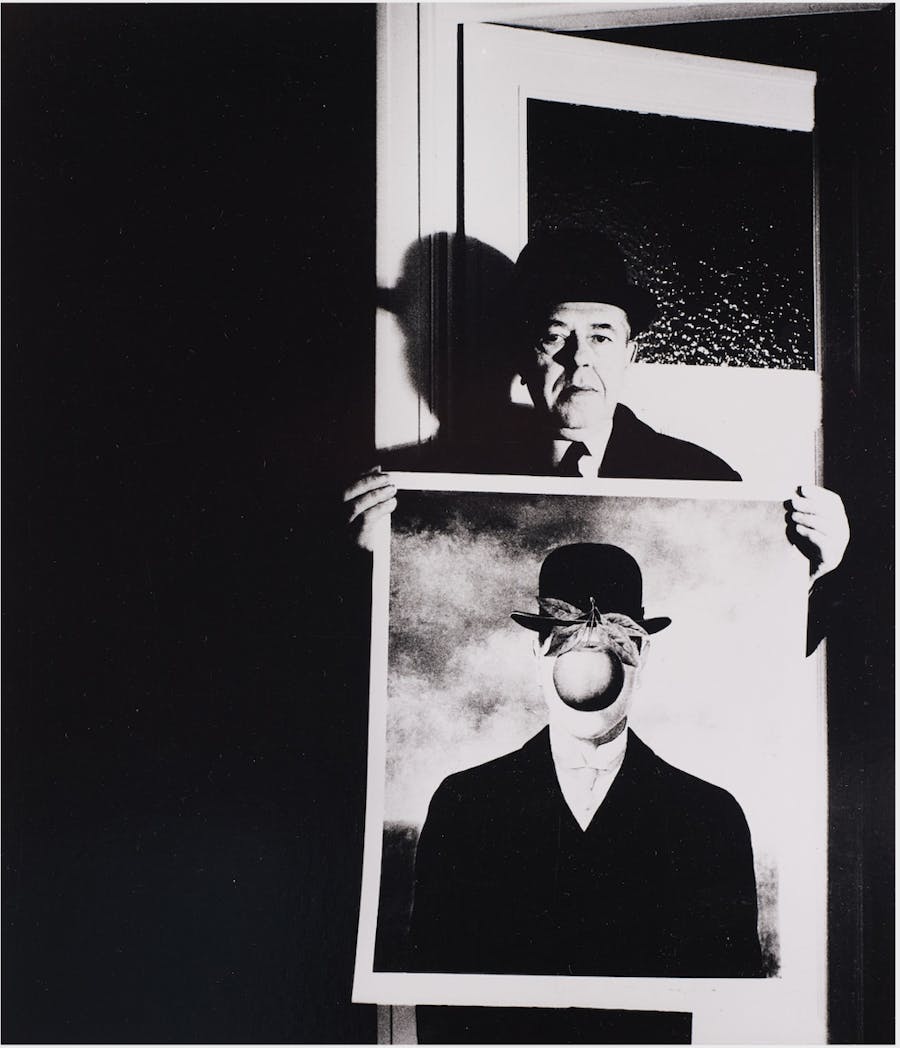 Bill Brandt, ‘René Magritte with his picture 'The Great War', Brussels’, 1966, Gelatin silver print, 33.8 x 29 cm. Photo: PHILLIPS