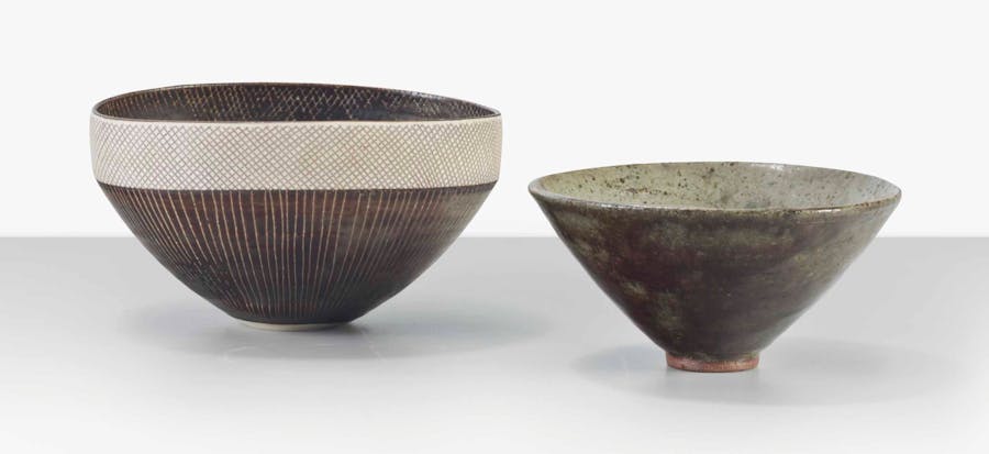 Lucie Rie (1902-1995), two bowls, ca. 1950. Left: porcelain, golden manganese glaze with sgraffito design, 8.5 cm.high, 16.5 cm. diameter. Right: glazed stoneware, 7 cm. high, 14 cm. diameter. Image via Christie's