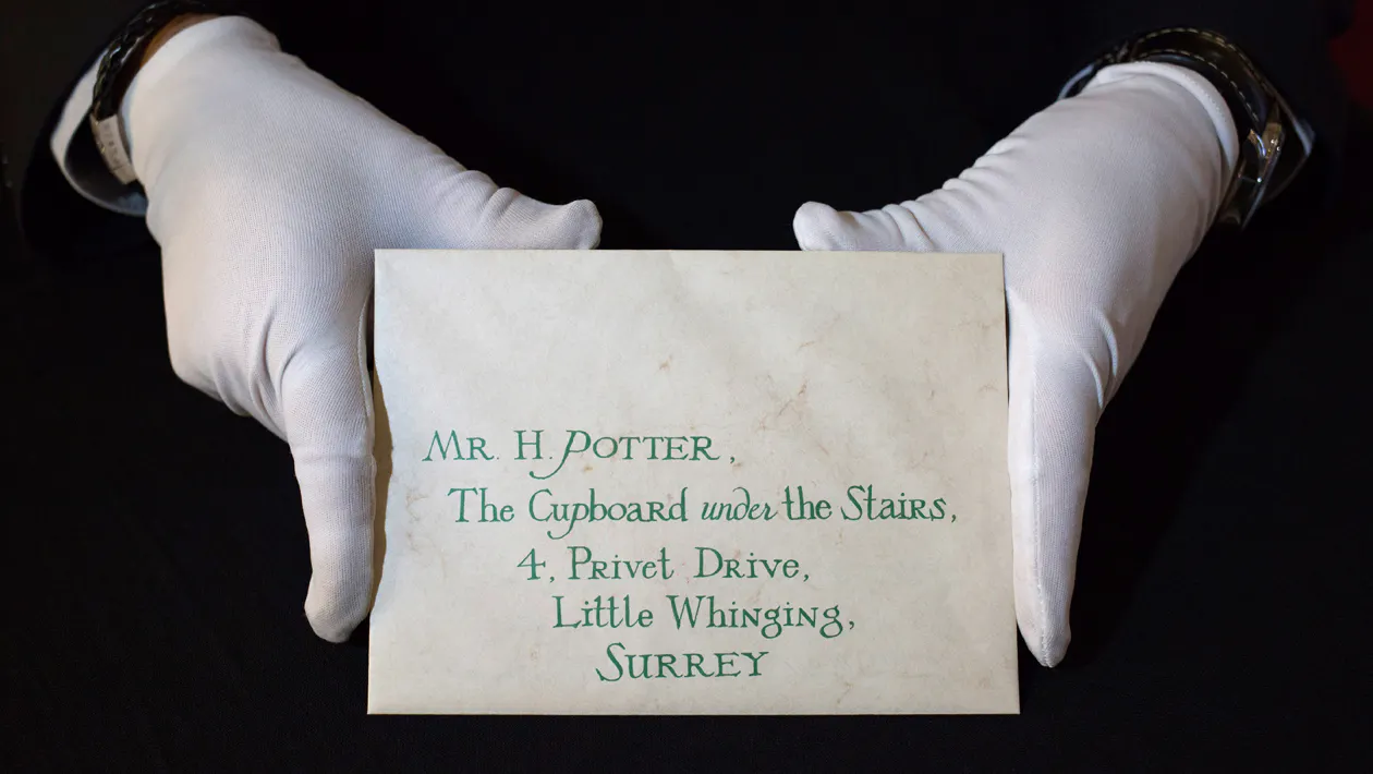 Harry Potter Hogwarts Acceptance Letter with Wax Seal from Harry Potter and the Philosopher's Stone (2001) estimated at £3k-£5k goes on display ahead of the Prop Store Rare Film and TV Memorabilia auction at BFI IMAX on 14 September 2016 in London. Photo by John Phillips/Getty Images