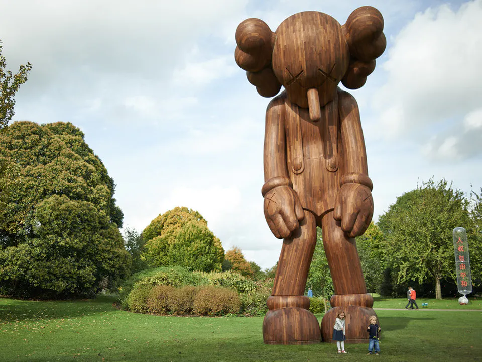 KAWS-SMALL-LIE-2013-Afromosia-H1000cm-x-W464cm-x-D427-dot-2cm-courtesy-the-artist-and-YSP