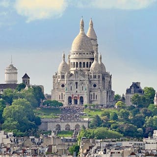 The Basilica of Sacré-Cœur de Montmartre. Photo by Jean-Pierre Dalbéra, CC BY 2.0, via Wikimedia Commons (detail)