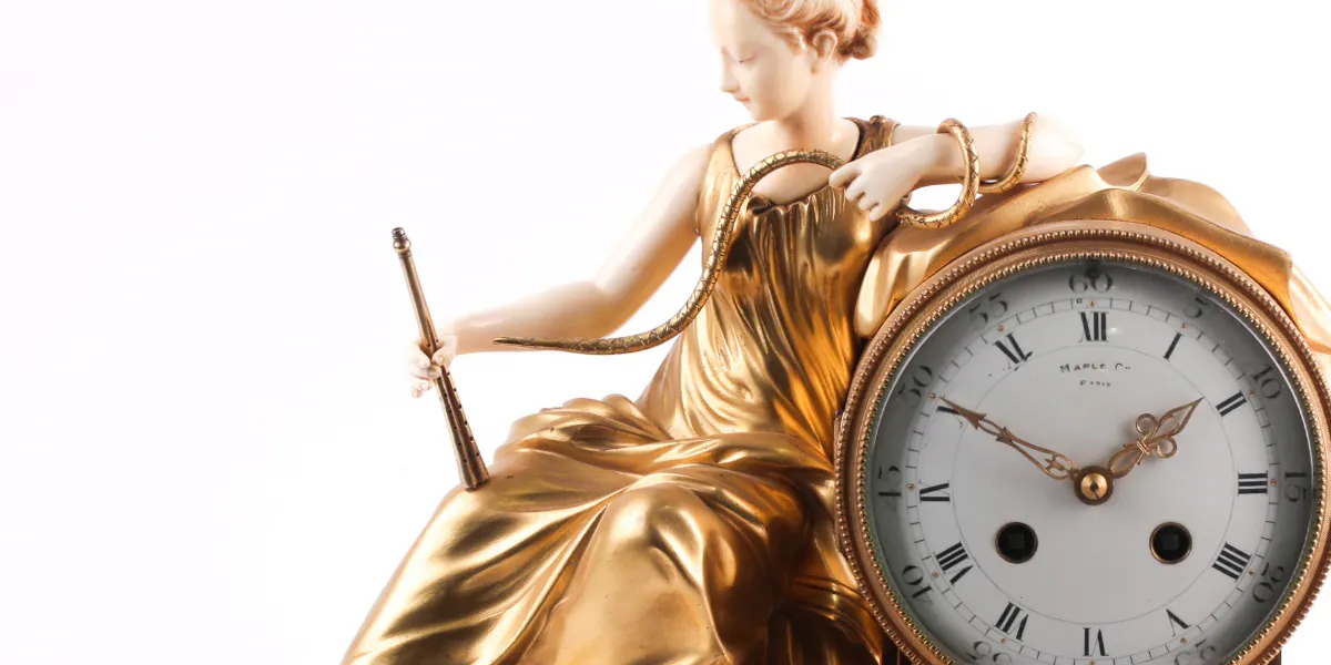 A 19th-century white marble, ivory and ormolu mantel clock. Photo © Dawsons