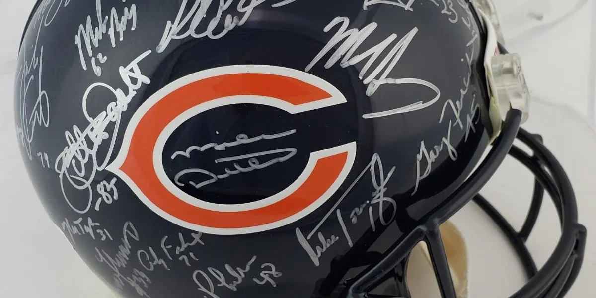 1985 Chicago Bears Super Bowl Champion Team Signed Full Size Authentic Helmet. © Auction of Champions (detail)
