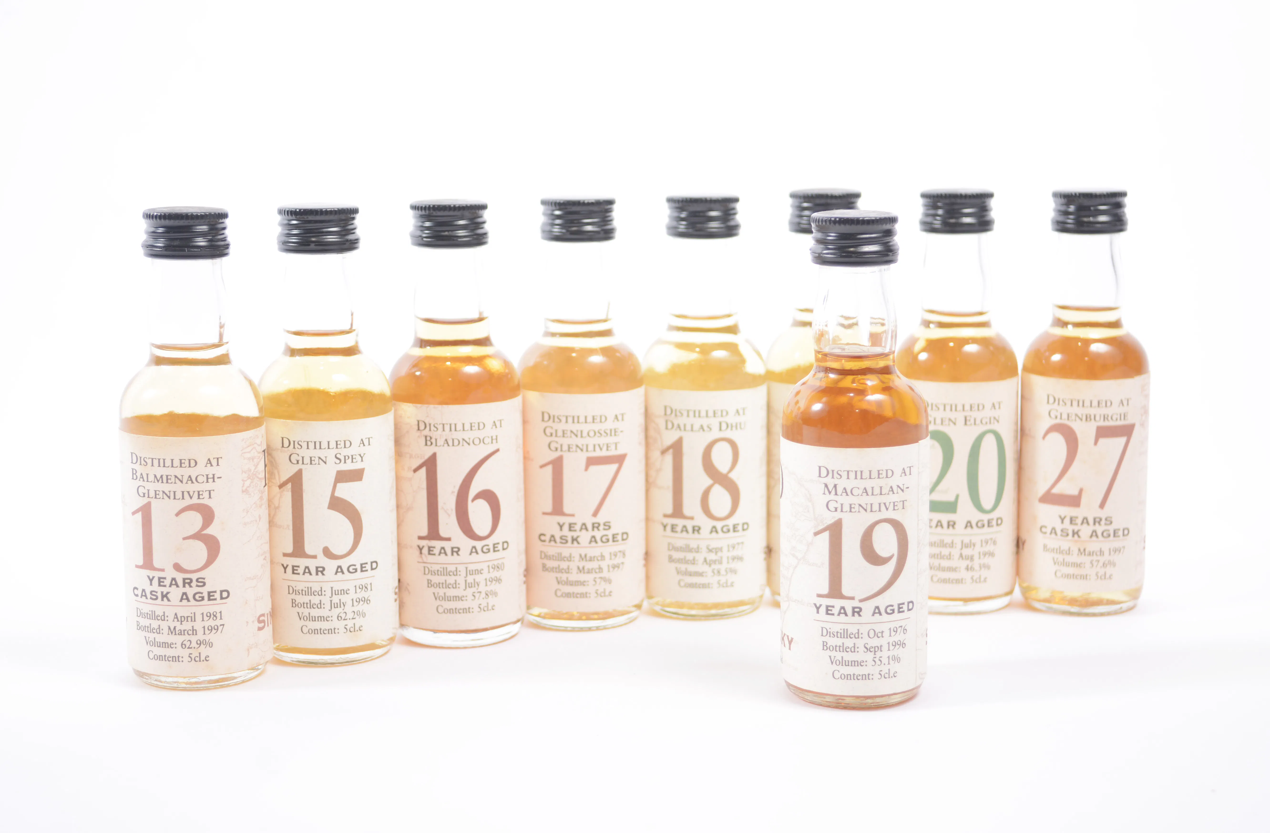 Ten Cask Strength whisky miniatures, bottled by The Whisky Connoisseur miniatures, including Macallan 1976, 19 year old. Photo © Gildings
