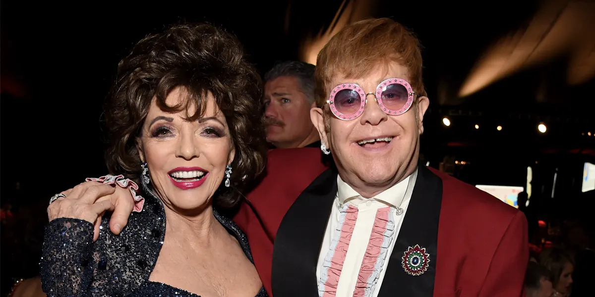 Joan Collins and Sir Elton John attend the 26th annual Elton John AIDS Foundation Academy Awards Viewing Party. Photo by Michael Kovac via Getty Images for EJAF
