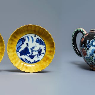 The auction house is specializing in the field of Chinese porcelain and Dutch Delftware. These are lots 369 - A pair of lobed Chinese blue and white yellow edge plates with 'hare' marks, Wanli and lot 702 – A black Delftware teapot, image © Rob Michiels