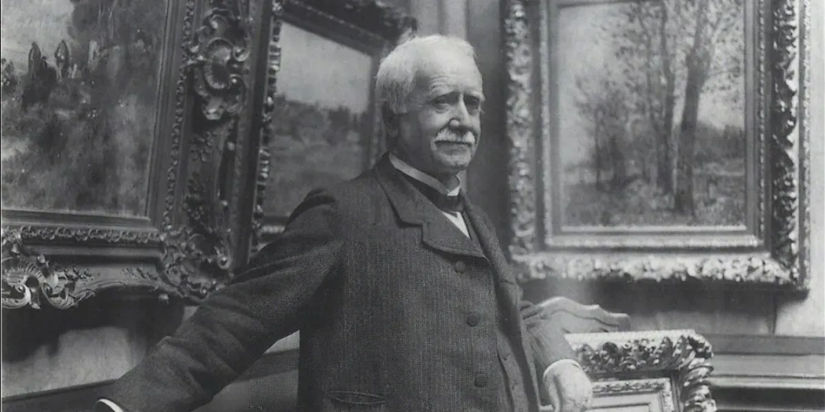 Paul Durand-Ruel dans sa galerie en 1910. Photo de Dornac. Image du domaine public (détail)