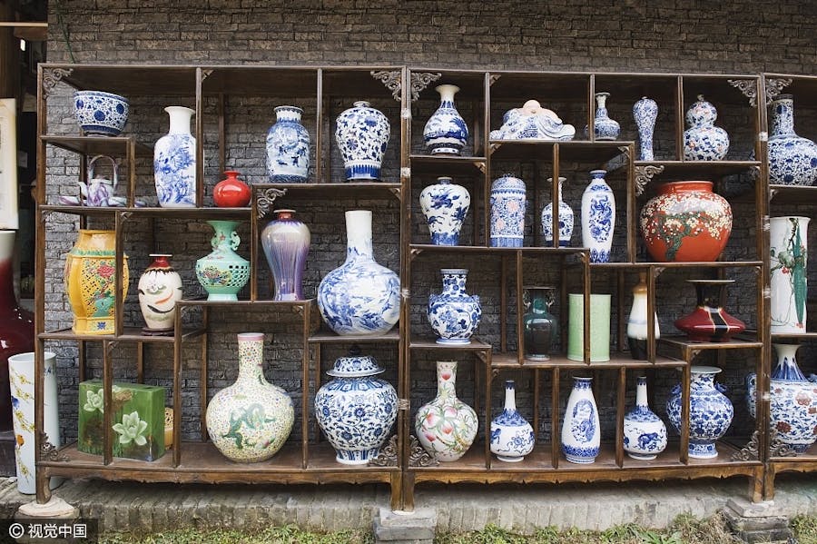 Display of vases at Qing and Ming ancient pottery factory in Jingdezhen, Jiangxi province. Image © VCG