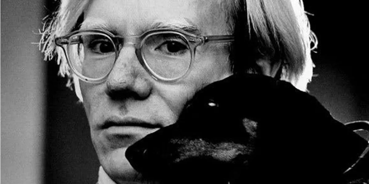 Jack Mitchell (1925-2013), photo portrait of Andy Warhol with Archie the Dachshund, 1973 (detail). Photo by Jack Mitchell via Wikimedia Commons / CC BY-SA 4.0