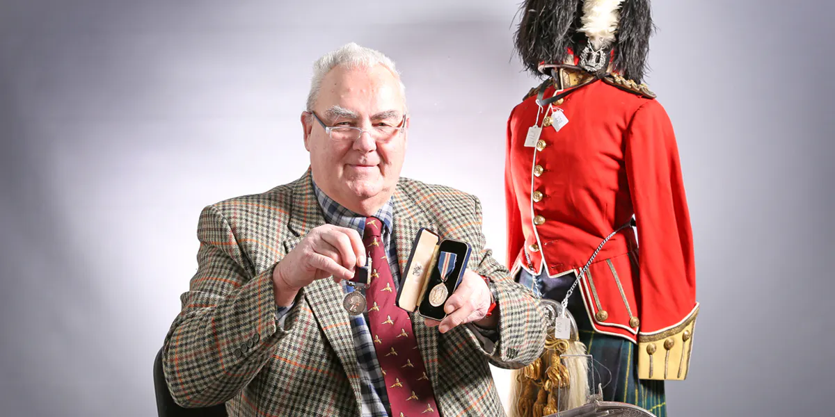 David Douglas, in charge of the new Militaria Department at Elstob & Elstob, is pictured holding the boxed Queen’s Gallantry Medal and the RAF Long Service & Good Conduct Medal presented to Flight Sergeant William Barker Oldroyd. Also in the photograph are items from a single-owner collection of Gordon Highlanders’ militaria [cropped]. Photo: Elstob & Elstob