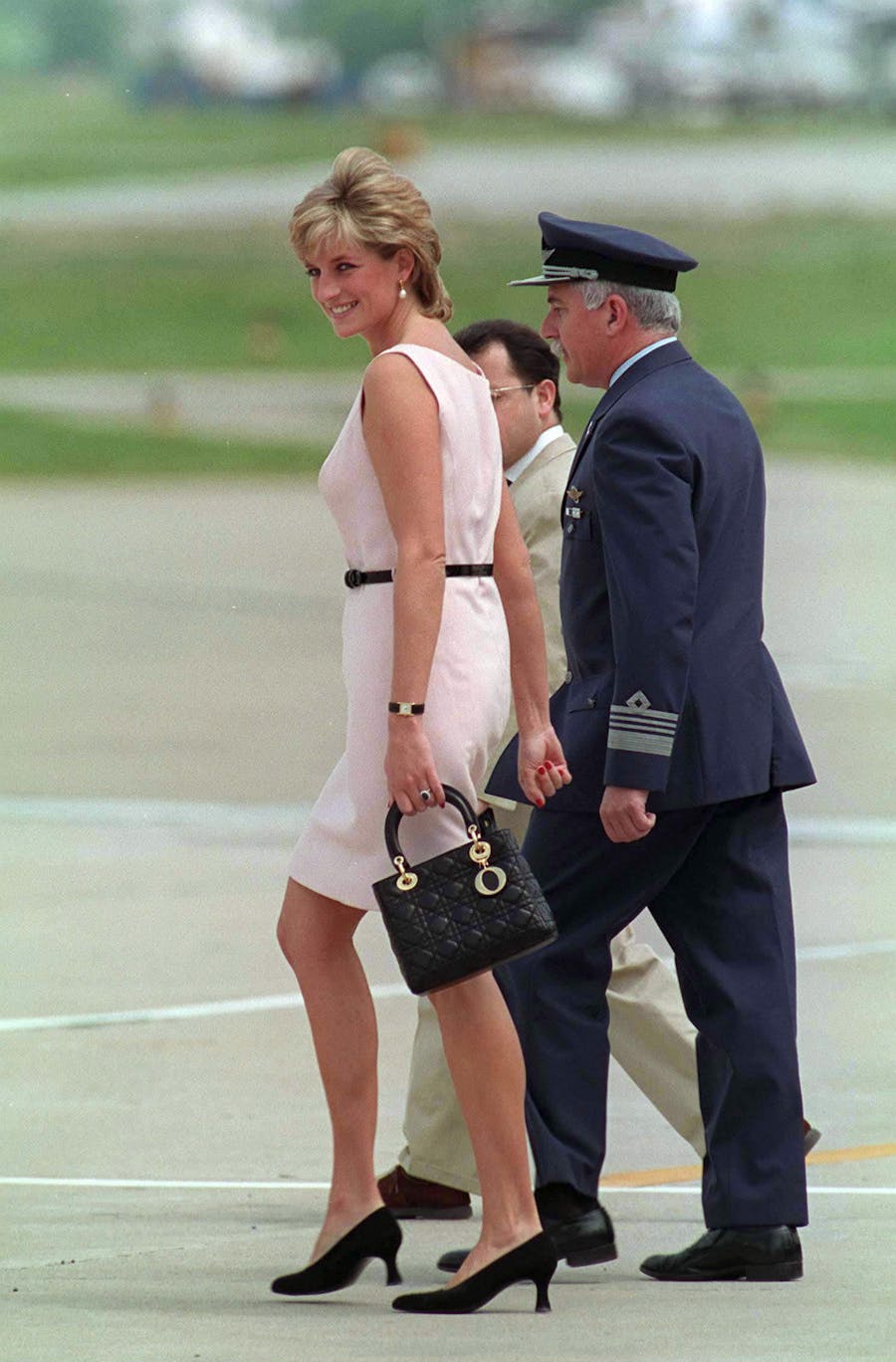 Princess Diana at Buenos Aires airport, Argentina with her Lady Dior bag, 1995. Photo by Tim Graham Photo Library via Getty Images