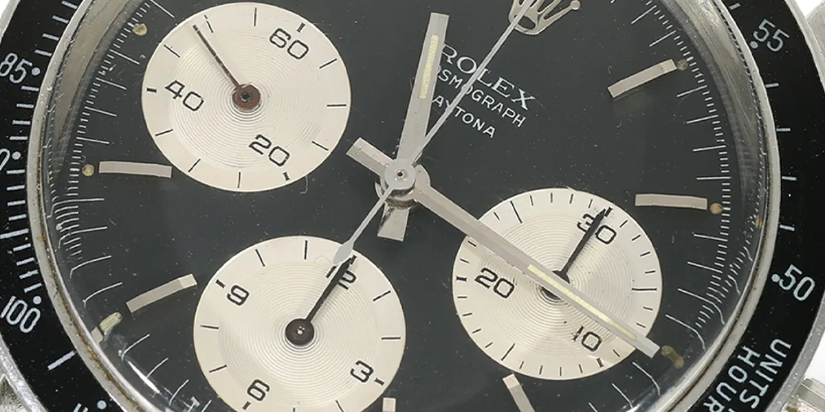 Vintage Rolex Daytona Ref. 6240 "Black Dial", Stahl, Fullset, deutsche Papiere 1970. Foto © Cortrie (Detail)