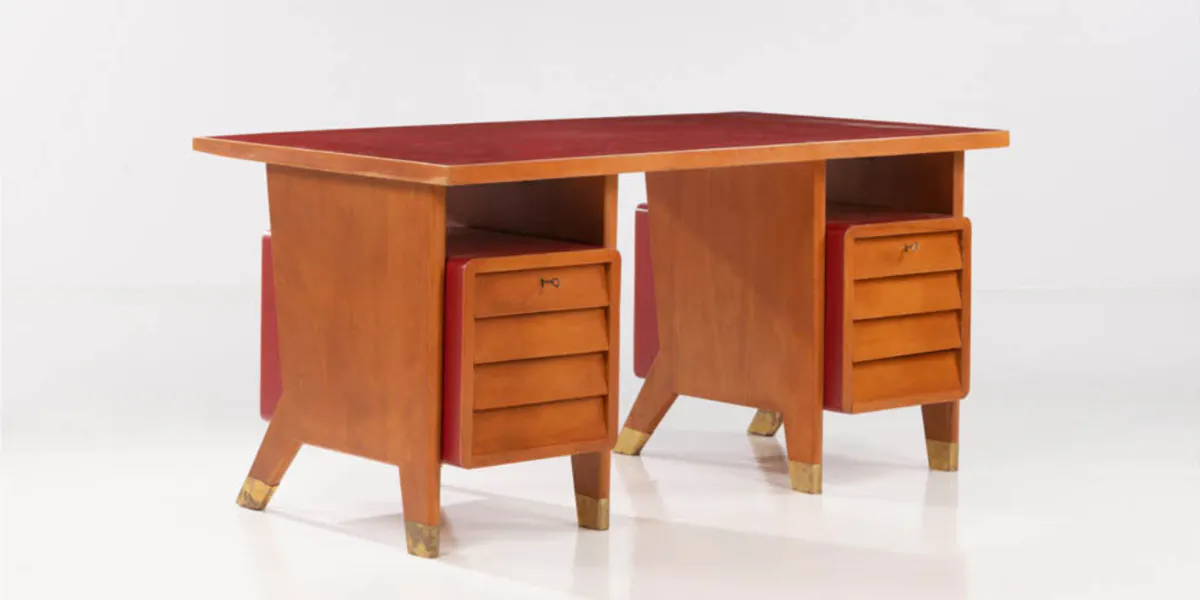 Gio Ponti (1891-1979), desk, walnut, brass and melamine, c. 1950, 80 x 166 x 90.5 cm. Photo: PIASA