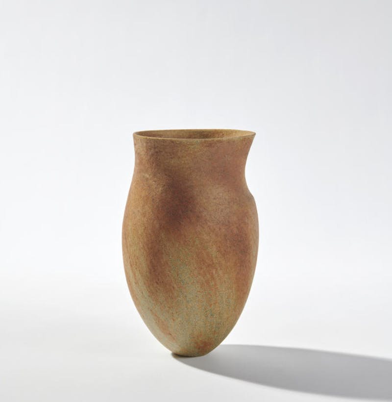 Jennifer Lee, Asymmetric Amber Lichen Vase, 1985-86. Coil-built and burnished stoneware, metallic oxides. Photo © Bonhams 