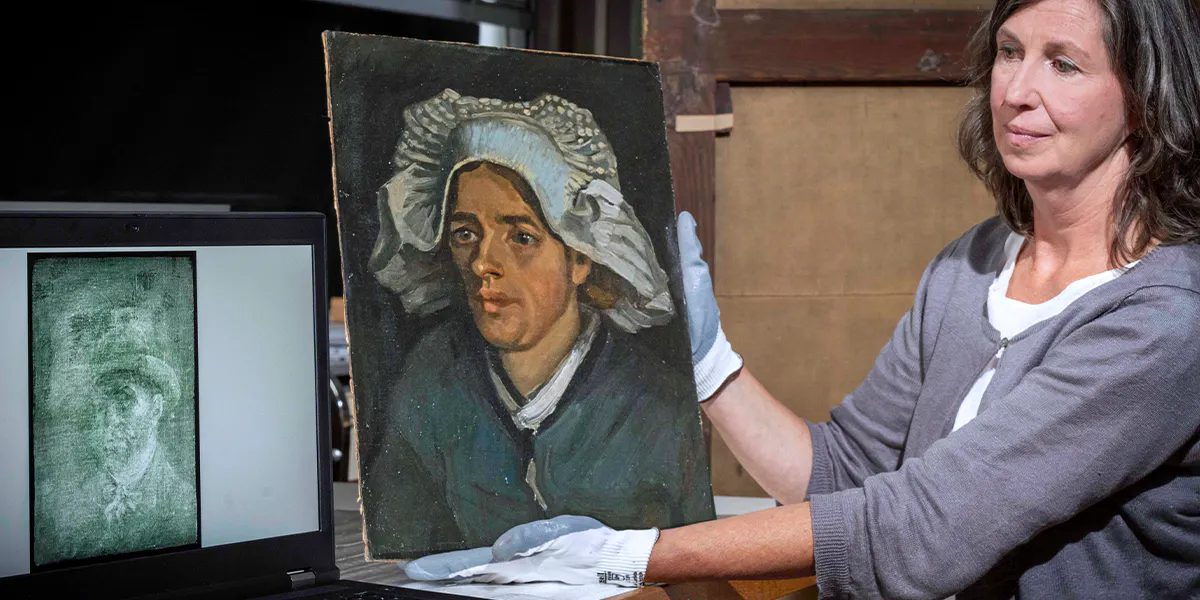 Senior Conservator Lesley Stevenson views Head of a Peasant Woman alongside an x-ray image of
the hidden Van Gogh self-portrait. Photograph by Neil Hanna (detail)