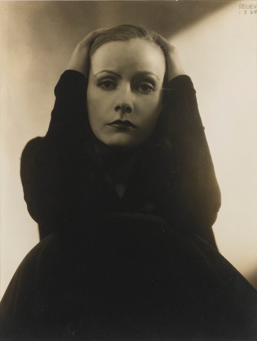 Model Wearing A Black Coat With Fur Trim by Edward Steichen