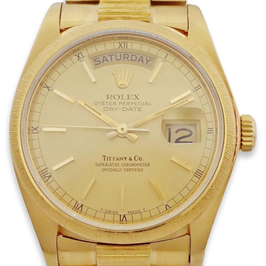 Rolex President, Tiffany & Co., 18k Gold Bark Men’s Watch w/ Box. Image © Hess Fine Auctions
