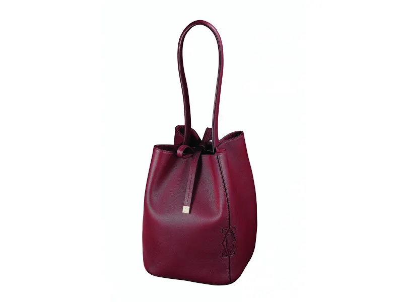 Bolso de CARTIER en piel color burdeos