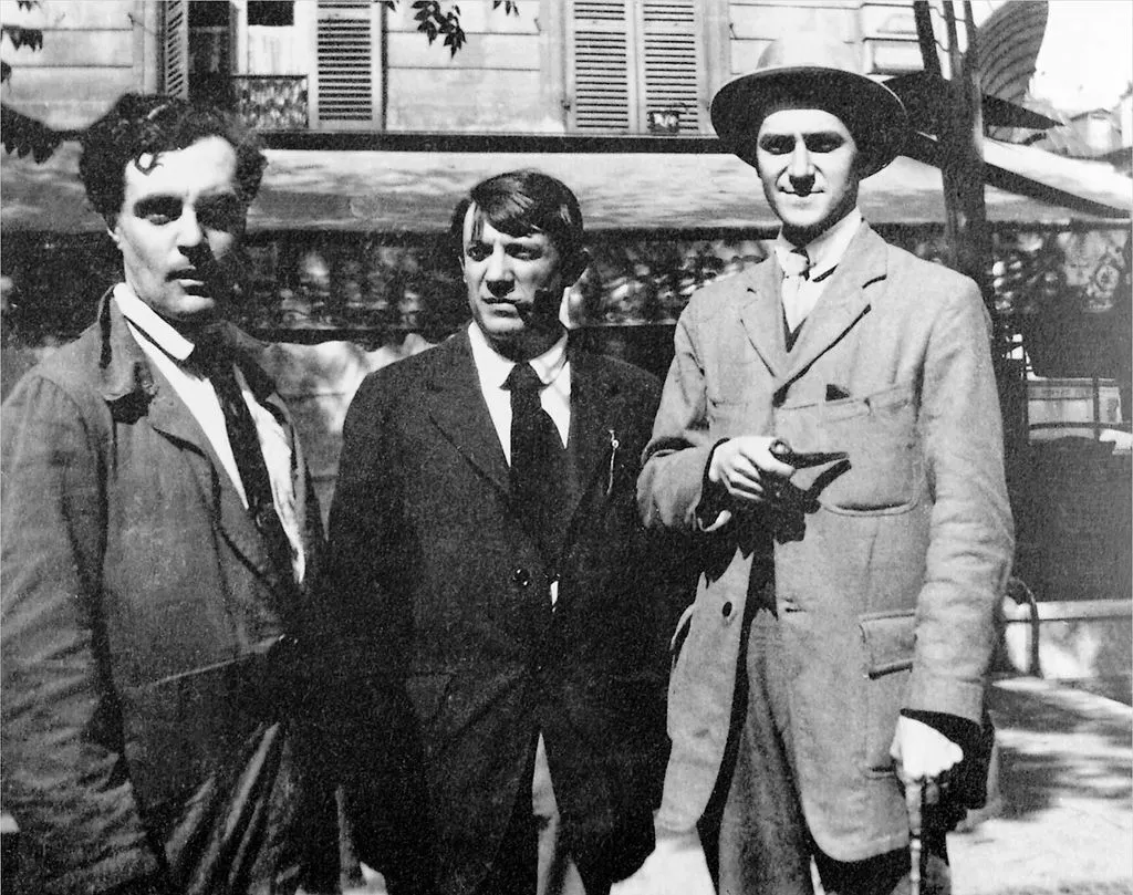 Modigliani, Picasso y André Salmon en el Café de la Rotonde, París, 1916. Imagen vía Modigliani Institut Archives Légales, Paris-Rome