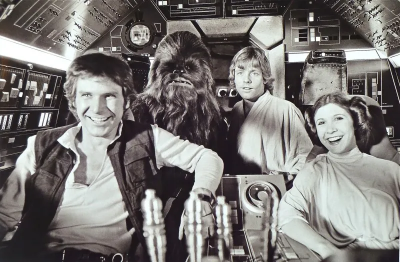 Han Solo, Chewbacca, Luke Skywalker och Leia på Årtusendefalken.