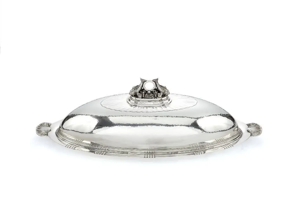 Georg Jensen, a Danish silver oval fish dish, drainer and cover. Photo: Dreweatts