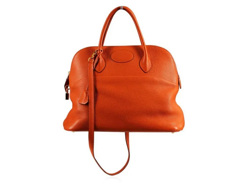 Bolso HERMÈS Bolide de cuero naranja. La subasta comienza el 20 de enero