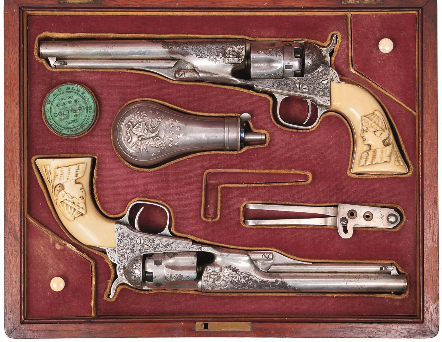 A Cased Pair of .36 Calibre Five-shot Silver Plated Consecutively Numbered and Engraved Colt Police Revolvers. Photo: Antony Cribb