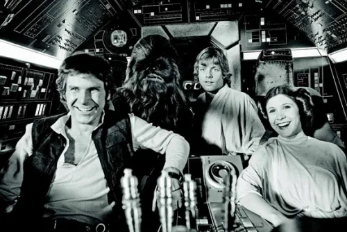 Han Solo (Harrison Ford), Chewbacca (Peter Mayhew), Luke Skywalker (Mark Hamill) and Princess Leia (Carrie Fisher) on board the Millennium Falcon