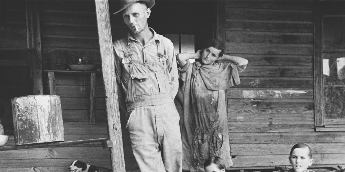 A family on their porch during the Great Depression in the United States.(Photo by Walker Evans/Hulton Archive/Getty Images) (detail)