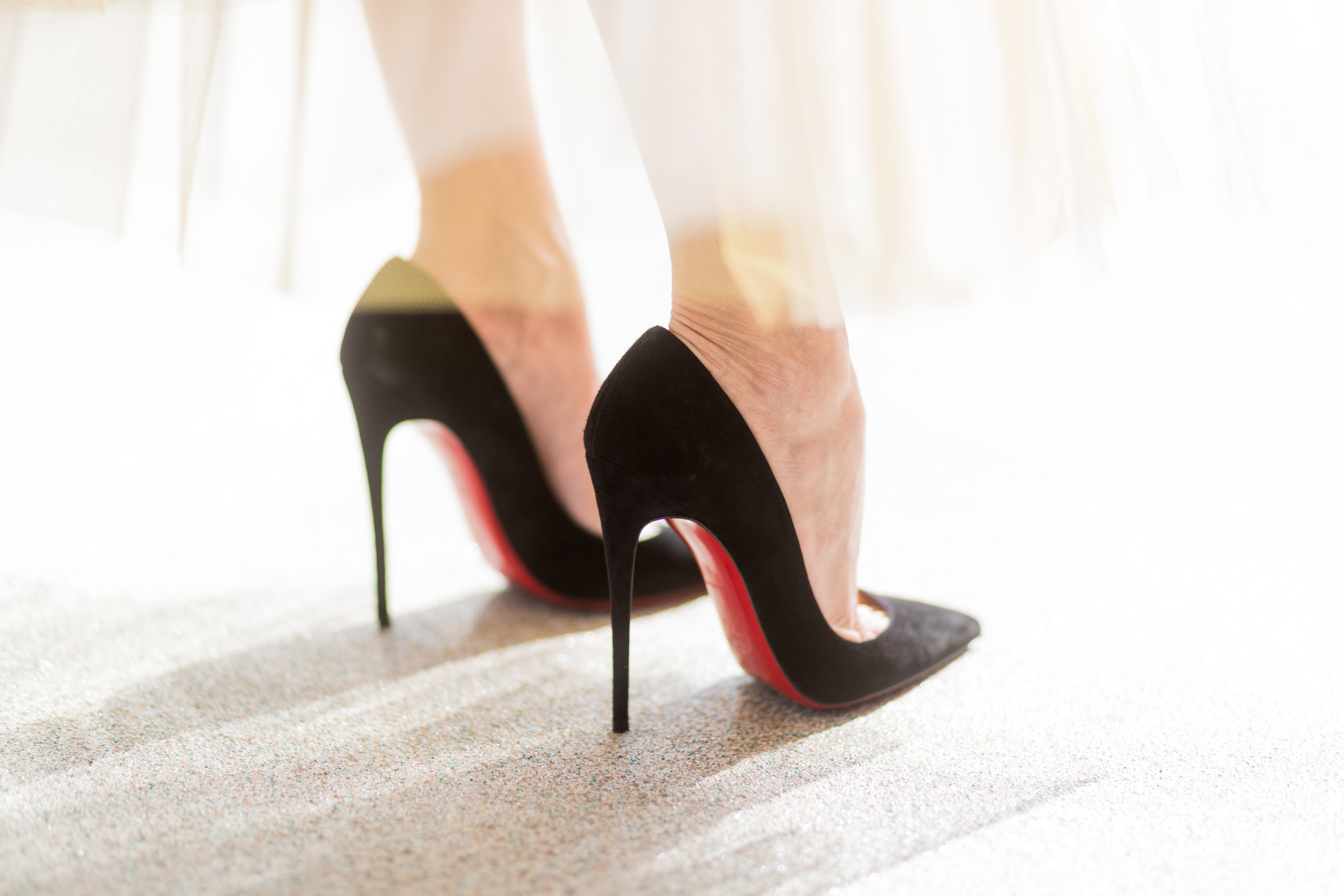 christian louboutin black heels red bottom