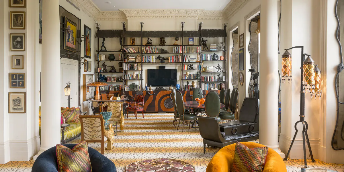 A wide view of Pauline Karpidas’ salon in her London home, the walls hung with artworks by Pablo Picasso, Francis Picabia, Victor Brauner, Oscar Dominguez and Dorothea Tanning, among others. Furniture and design pieces by Claude Lalanne, Jacques Grange and Mattia Bonetti. Photo © Sotheby's (detail)
