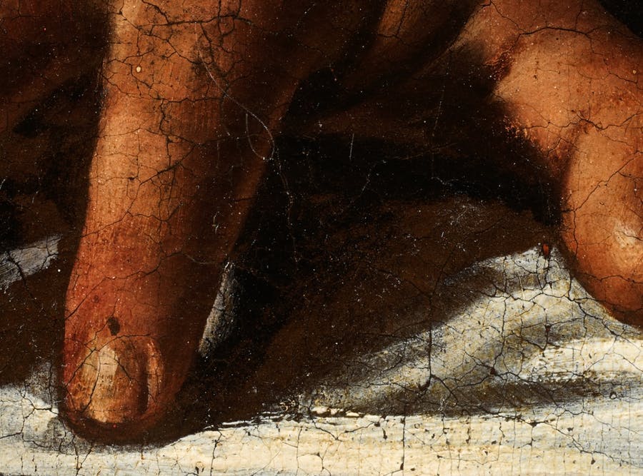 In this detail of Holofernes’ hand, the brown paint is left in reserve to mark the shadows, the to the technique ‘a risparmio’, image © The Toulouse Caravaggio