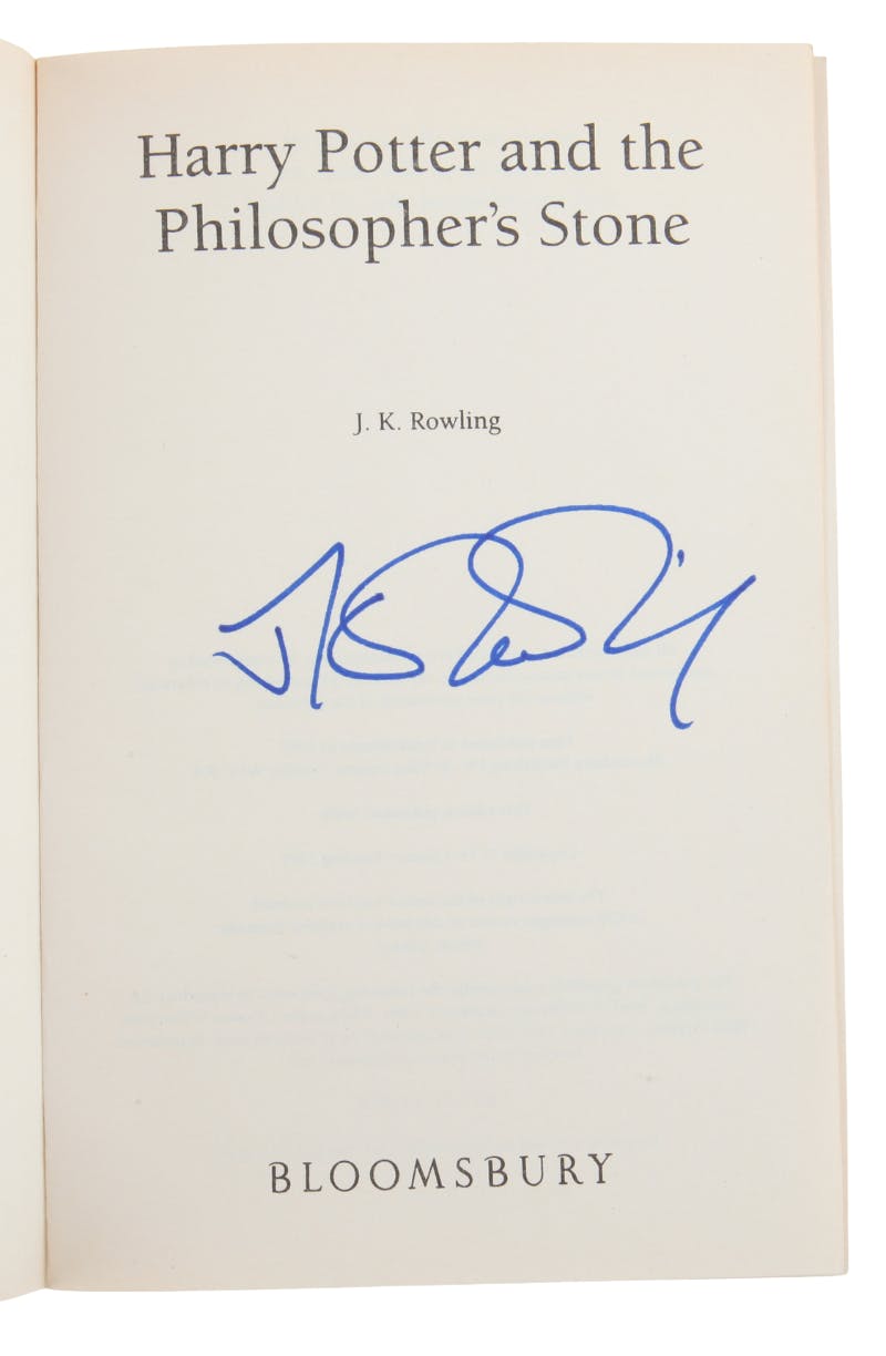 Harry Potter and the Philosopher's Stone, Paperback book signed on the title page by J.K. Rowling, published by Bloomsbury. With certificate of authenticity from JJG Autographs. Photo © Ewbank's