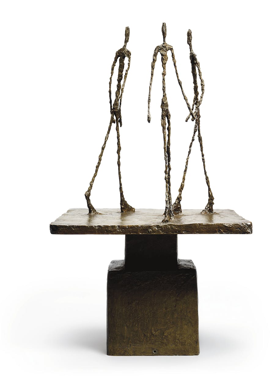 Alberto Giacometti (1901-1966), Trois Hommes qui Marchent I, conceived 1948, bronze with patina, 72 cm. Image via Christie’s.