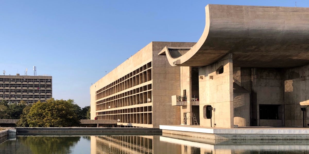 The Palace of Assembly located at the Capitol Complex of Chandigarh designed by Le Corbusier, originally meant to serve as the building for Legislative Assembly of bicameral East Punjab state. By UnpetitproleX - Own work, CC BY-SA 4.0 (detail)